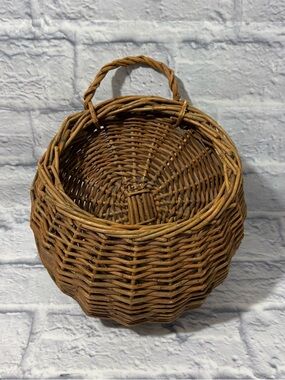 Vintage woven wicker rounded hanging basket